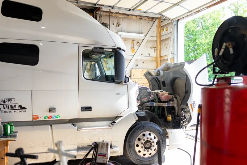 Semi truck in the Truck Shark bay during service